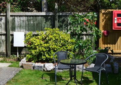 Garden seating area with plants and table